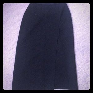 Long black skirt with thigh high slit in the front